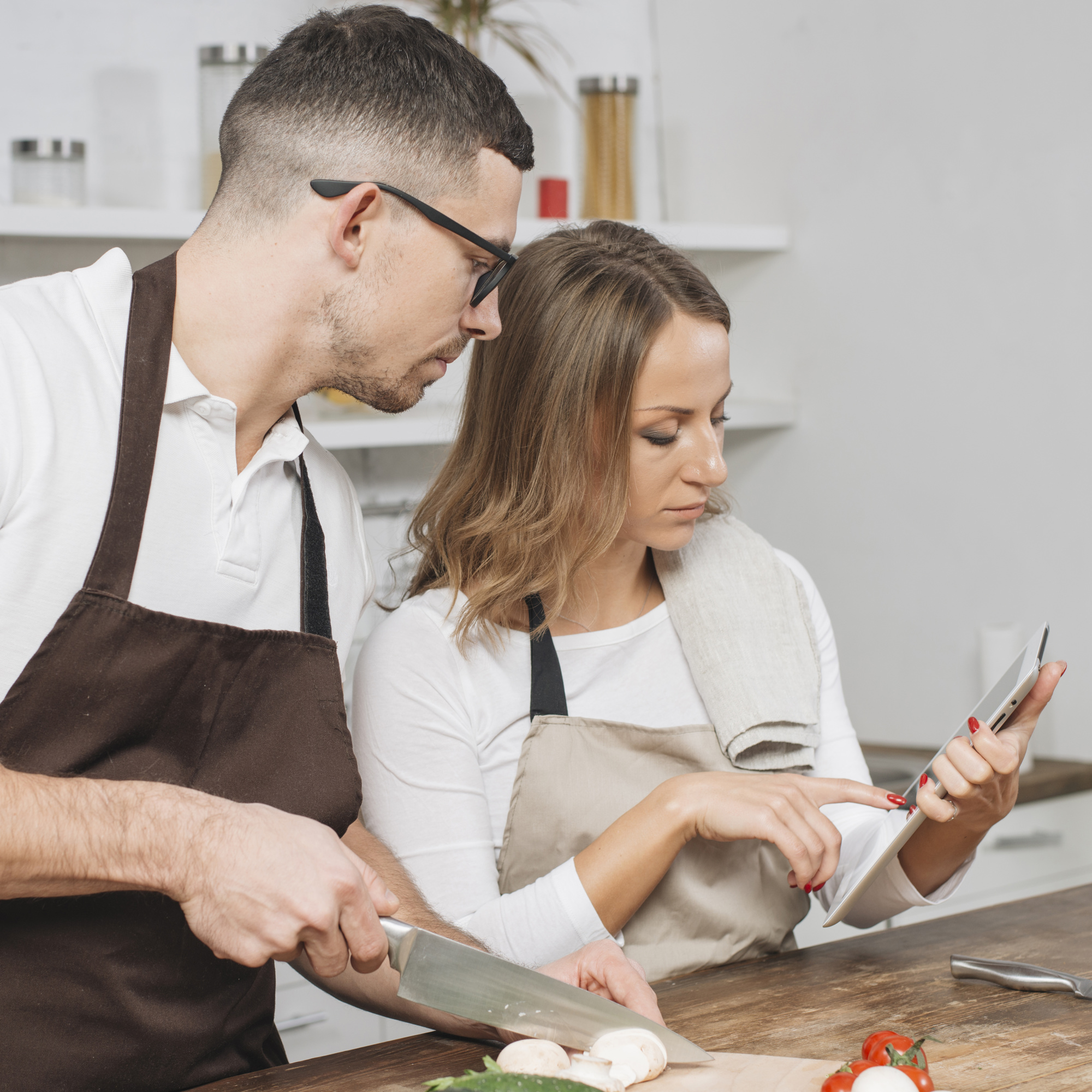 Consultant discussing menu with chef