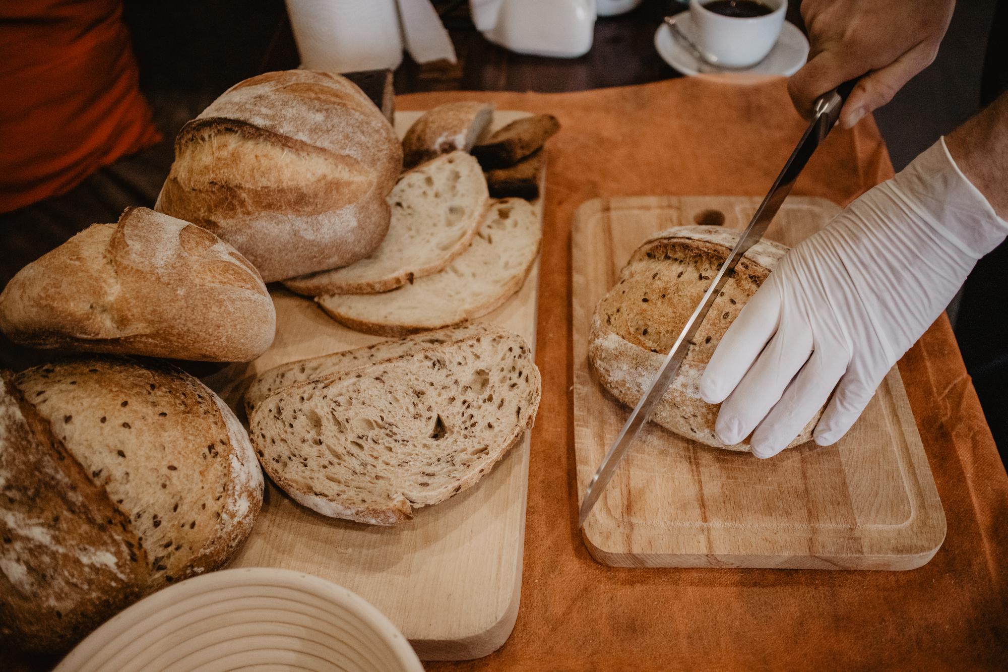 Artisan bread loaves cooling in workshop